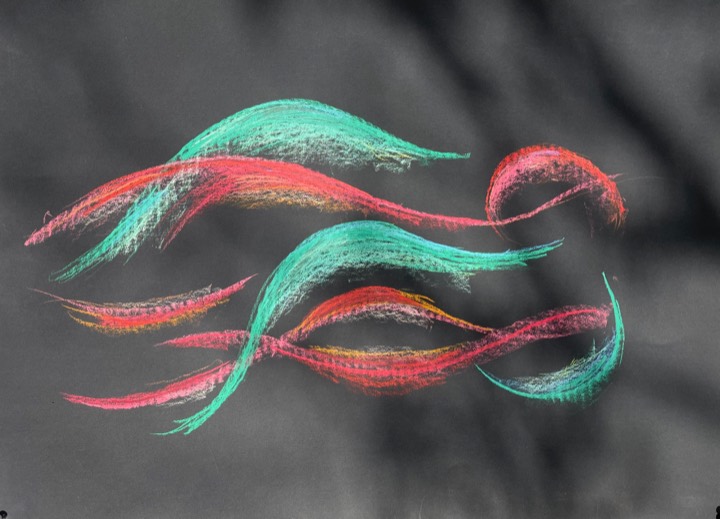 Sweeping turquoise and red strokes curving across a dark charcoal background.